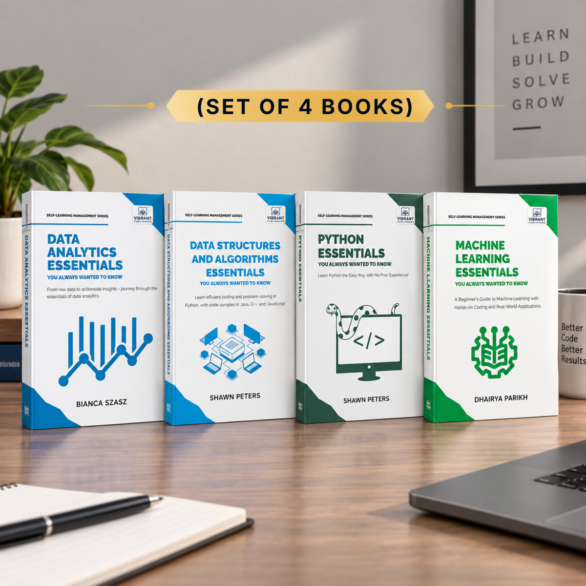 Four book covers displayed on a wooden desk in a styled indoor setting, with a pen, notebook, laptop edge, plant, and wall sign visible. The books are labeled 'Data Analytics Essentials,' 'Data Structures and Algorithms Essentials,' 'Python Essentials,' and 'Machine Learning Essentials,'