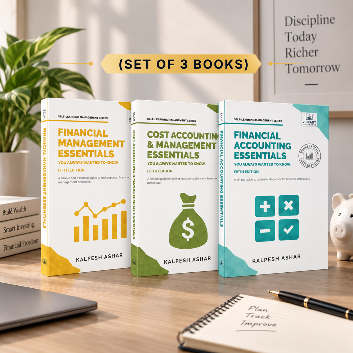 Three paperback books in a set displayed on a wooden desk: Financial Management Essentials, Cost Accounting & Management Essentials, and Financial Accounting Essentials. The books are branded by Kalpesh Ashar and feature distinct color schemes of yellow, green, and teal on white covers.