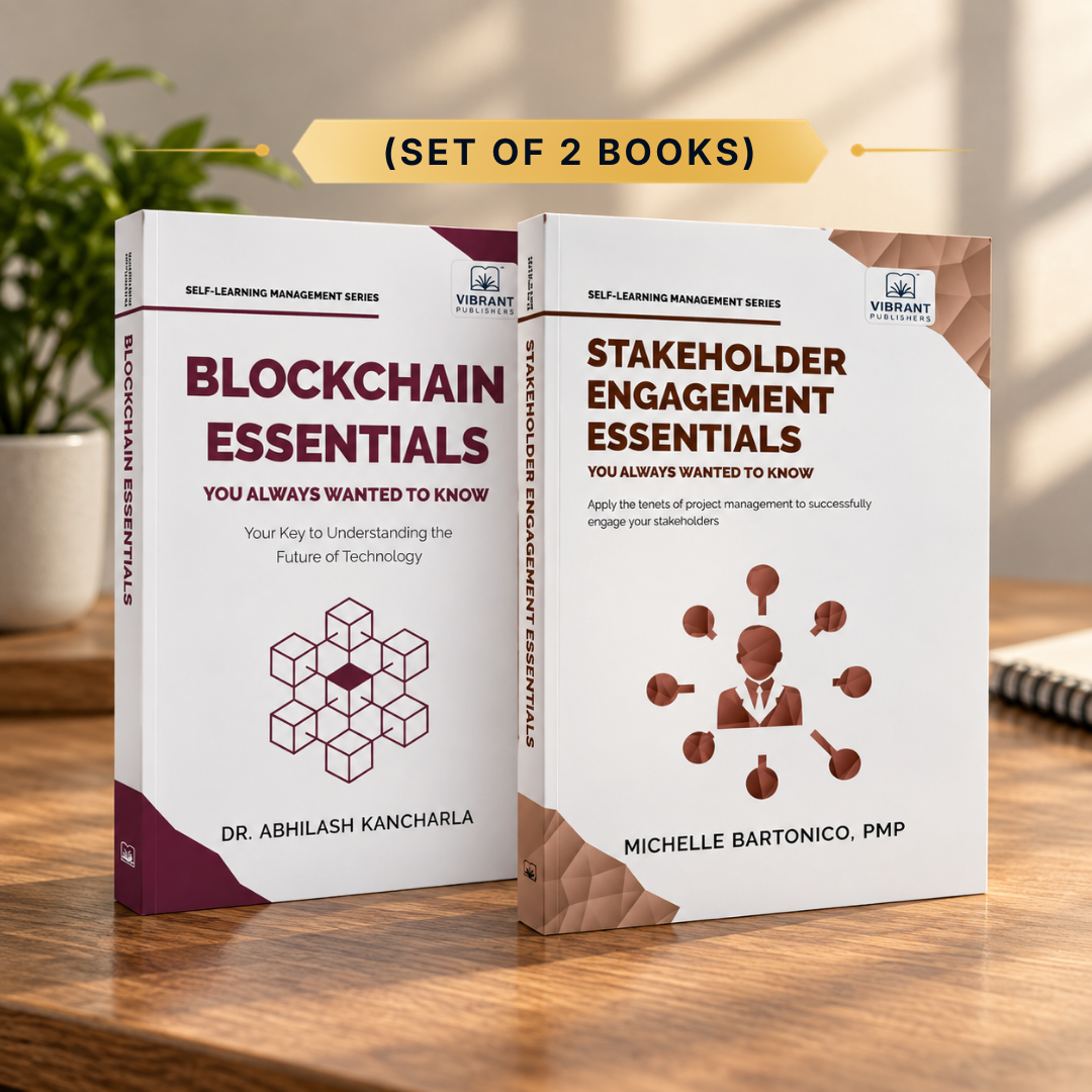 Two paperback books standing upright on a wooden surface: 'Blockchain Essentials' by Dr. Abhilash Kancharla and 'Stakeholder Engagement Essentials' by Michelle Bartonico, PMP.