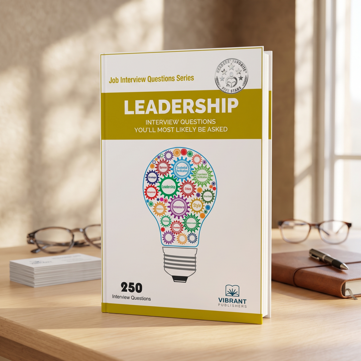 A paperback book titled "Leadership Interview Questions You'll Most Likely Be Asked" by Vibrant Publishers.