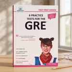 A paperback GRE test prep book by Vibrant Publishers stands open on a wooden surface with a blurred indoor background. The cover is predominantly white with pink accents, large black 'GRE' text, and a photo of a smiling girl with glasses and a red bandana.