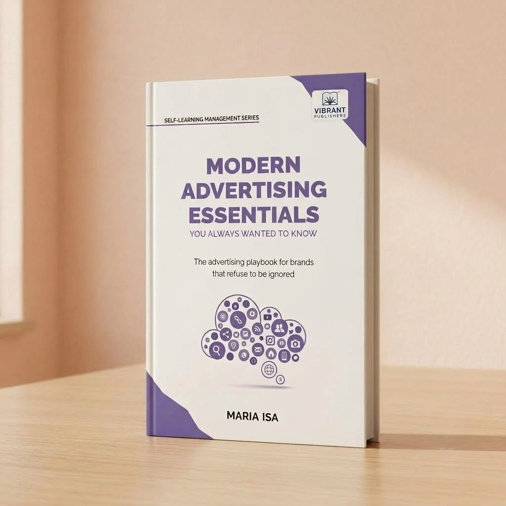 A paperback book titled 'Modern Advertising Essentials' by Maria Isa.